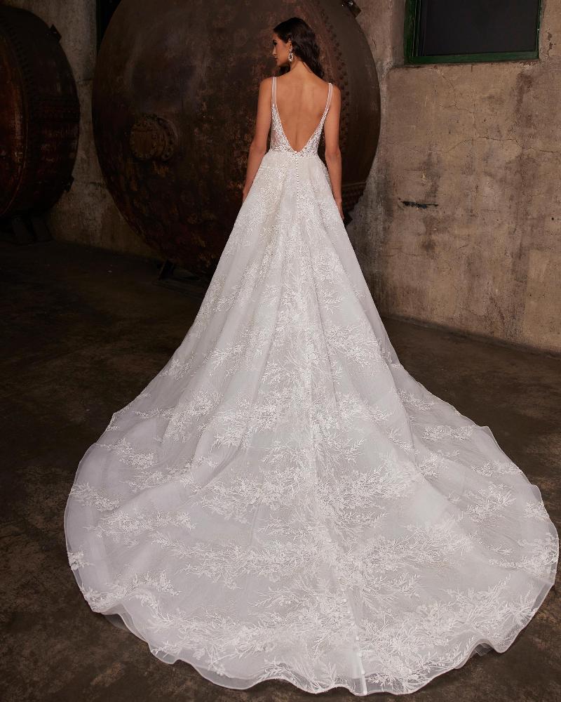 122230 long sleeve lace wedding dress with open back and a line silhouette7